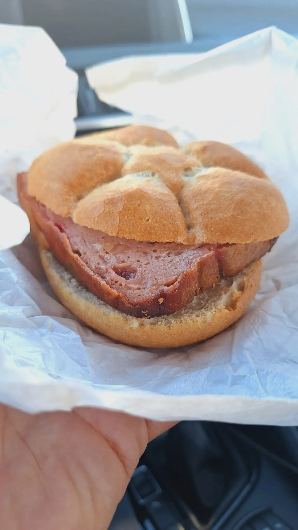 Leberkäse roll: a thick slice of Bavarian meat loaf in a bread roll
